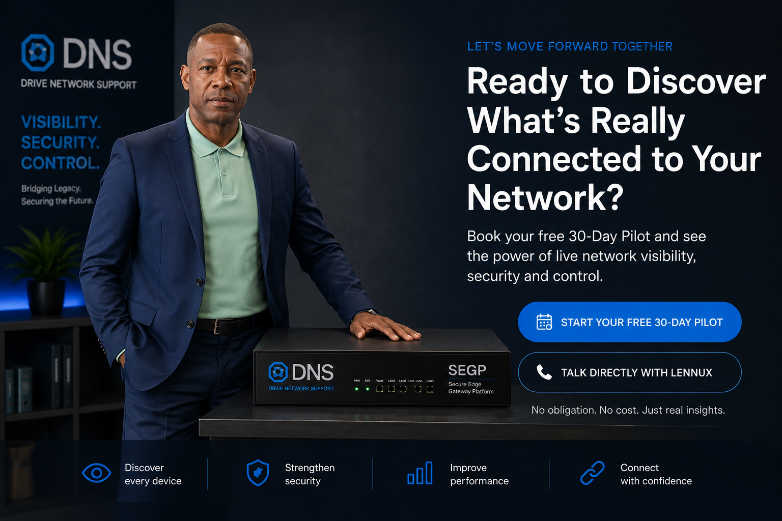 Lennux Ferdinand standing beside the Secure Edge Gateway Platform hardware